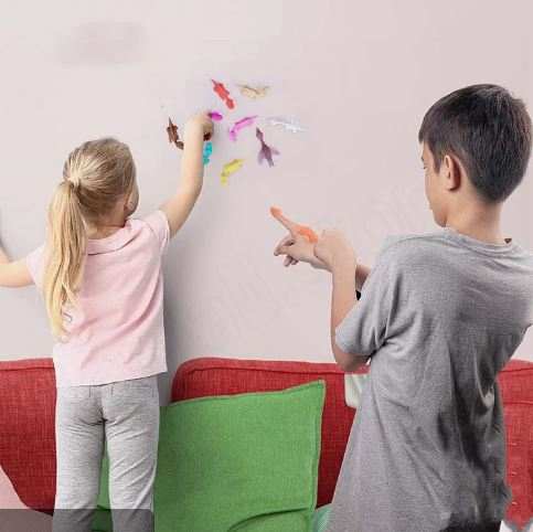 Slingshot Dino-Launch finger toy launching dinosaur figurine for portable Jurassic-themed play