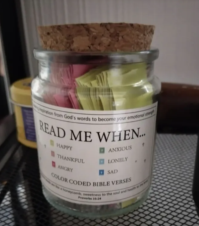 Glass jar with Bible verses cards for daily encouragement
