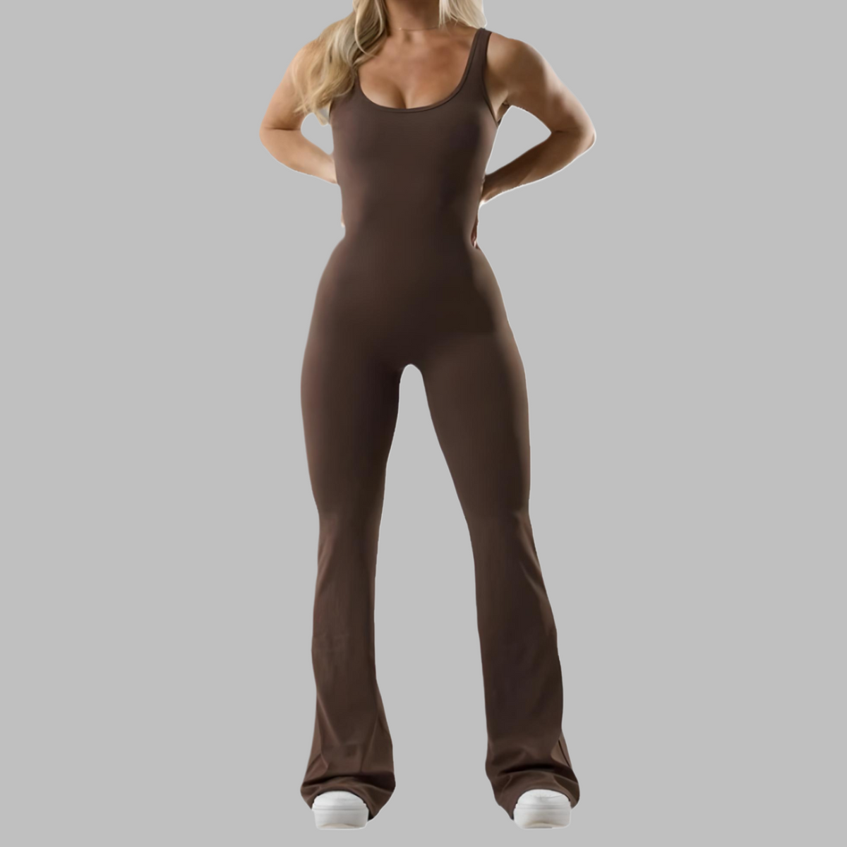 woman wearing stylish black flared jumpsuit with adjustable straps