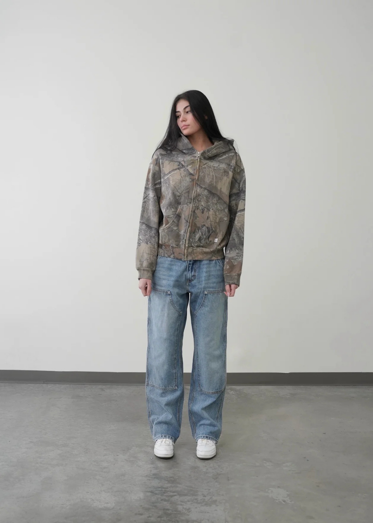 Unisex oversized urban camo hoodie with adjustable hood and bold print