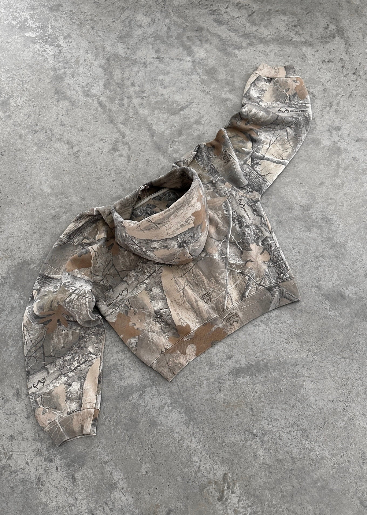 Urban camo hoodie with oversized fit and retro streetwear style