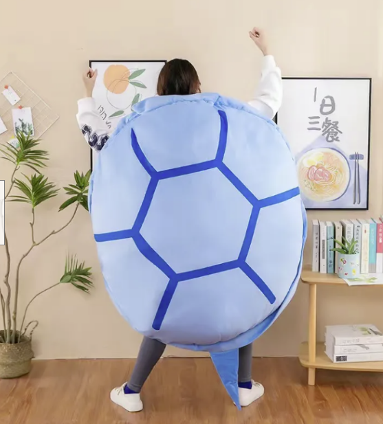 wearable turtle shell pillow hugging neck and shoulders